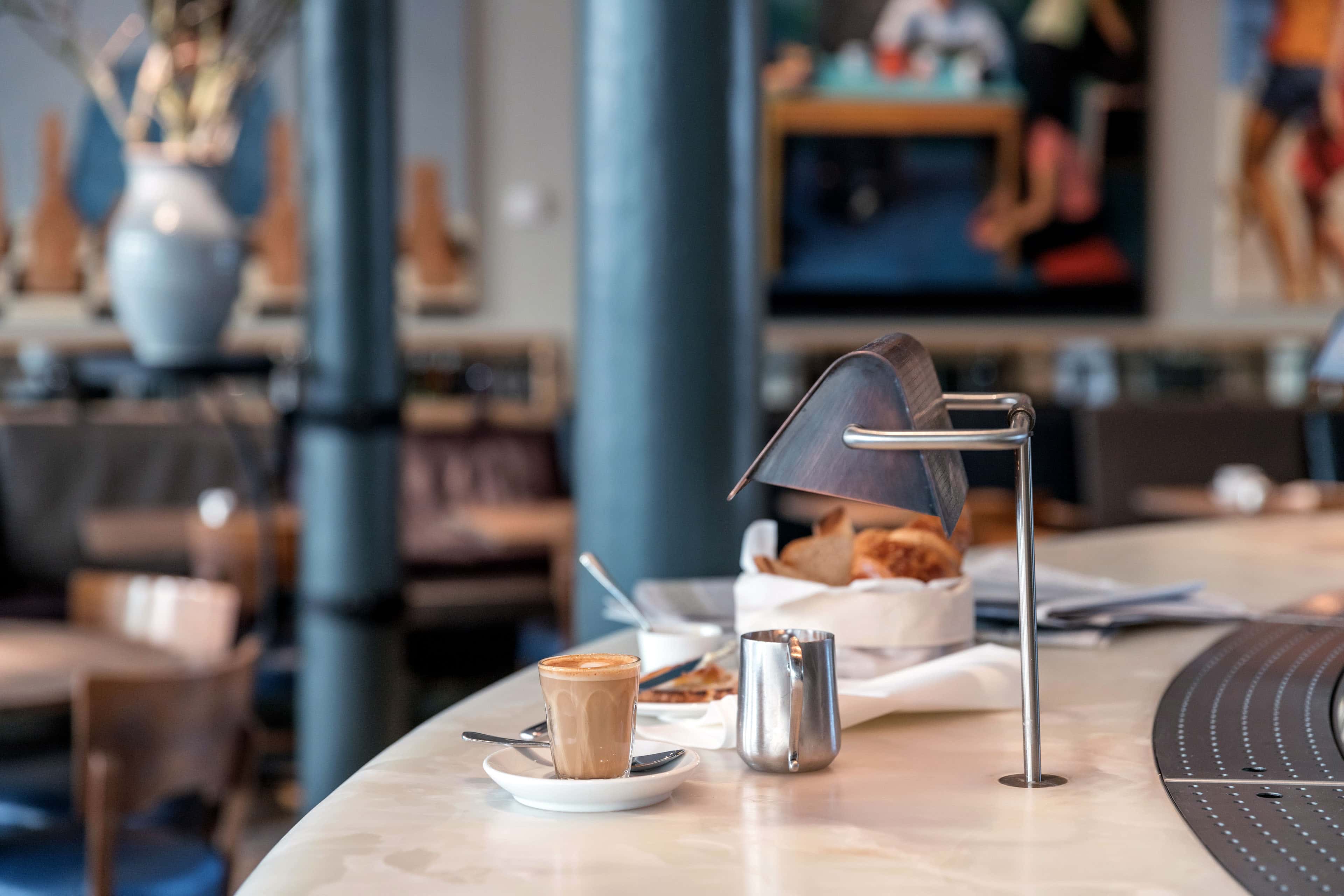 001 - 2016 - Quod Restaurant & Bar - Bar Breakfast Coffee Croissant Blue Painting - Web Hero